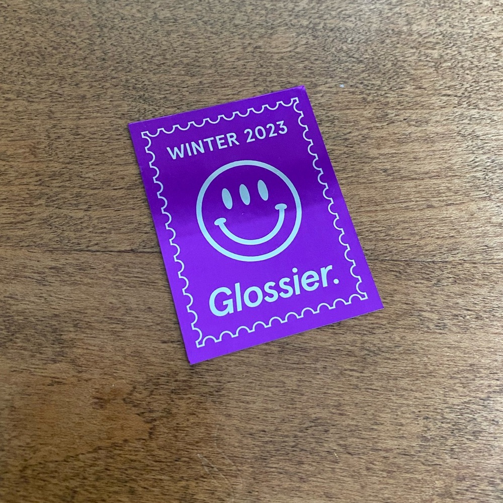 Free add-on for orders $20+: Glossier Sticker